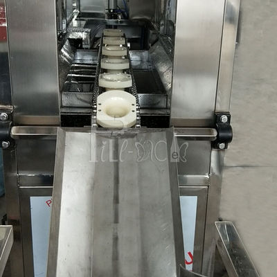 120bph/20l embotelladora del agua 3/5 galones con el dispositivo de cargamento automático del cubo proveedor