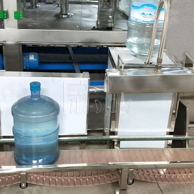 120bph/20l embotelladora del agua 3/5 galones con el dispositivo de cargamento automático del cubo proveedor