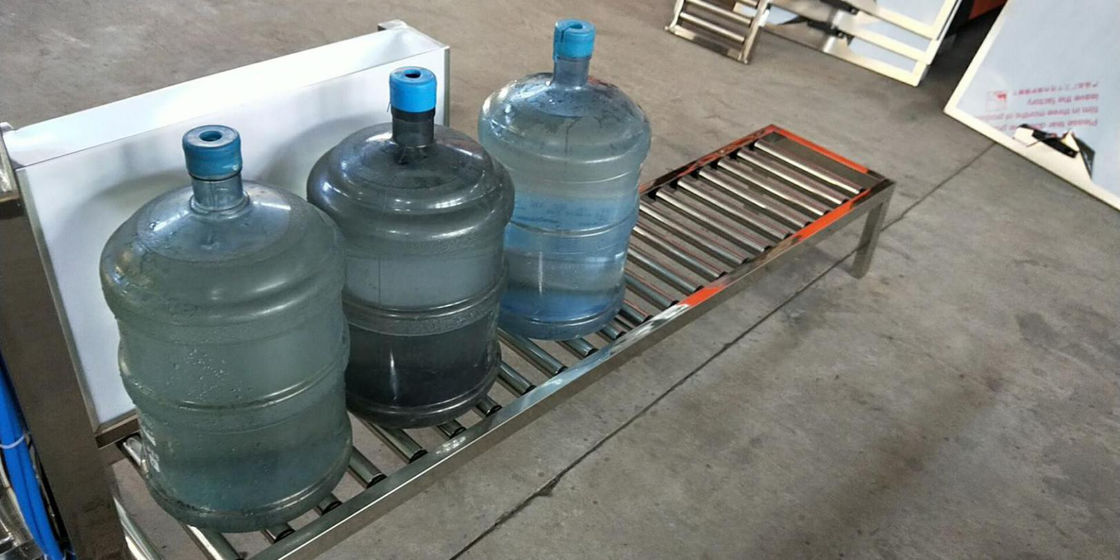 Materiales consumibles de la planta de agua del galón del transportador de rodillo para la cadena de producción de la botella del galón proveedor